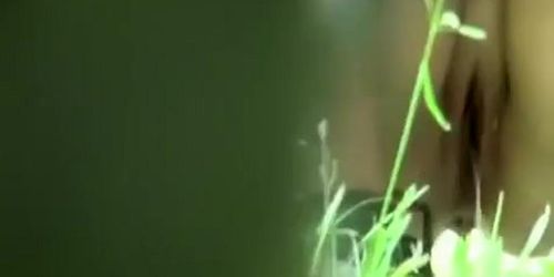 Woman spied through the bushes peeing