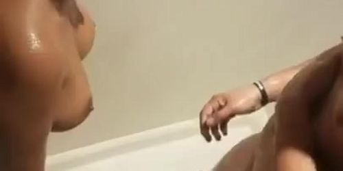 Husband records his wife in a bathtub