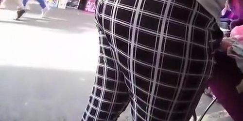 Big ass woman in black and white leggings