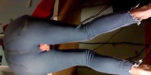 Emma pissing and working in tight jeans