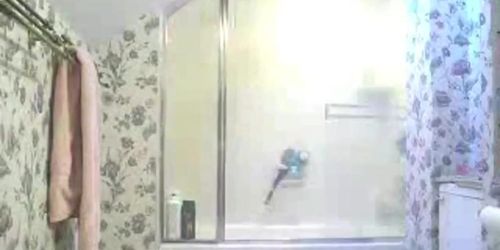 Punk girl getting ready for shower sees hidden cam