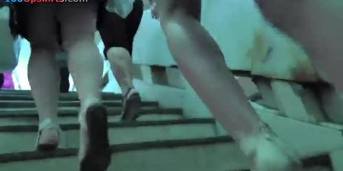 Golden-Haired upskirt oops discharged on the stairs