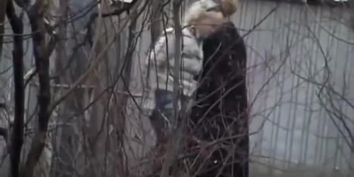 Hot girls piss behind an abandoned house