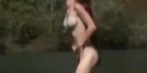 natural redhead getting off by river voyeur style micro mini bikini