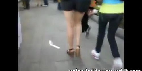 Candid sexy mother mini short and heels