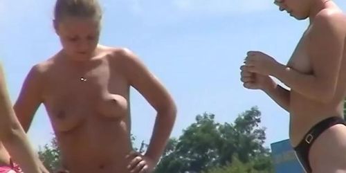 The topless amateur girls got on the voyeur beach cam