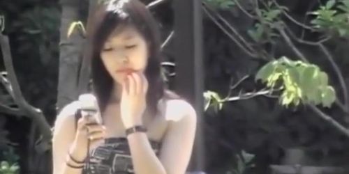 Girl Got Top Sharked While Reading The News On Her Phone