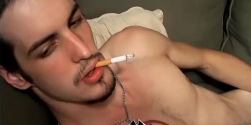 TWINK SMOKING - Straight rocker Axel plays his guitar and his throbbing cock with his pack of cigarette (Axel Braun)