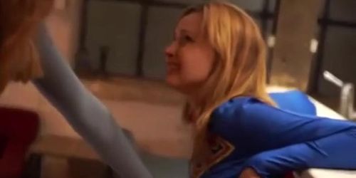 Superheroines Supergirl and Power Do Battle with Each Other