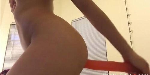 Bulging Her Stomach with a Large Anal Dildo