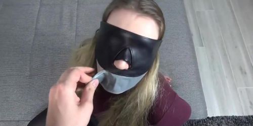 Tape gagged blowjob