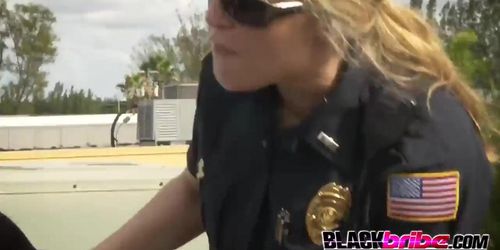 This Latin female cop likes to do some face sitting to this black dude with a huge tool.