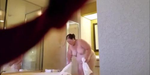 Grandma Chrissy gets her fat ass washed in a resort room in Florida.