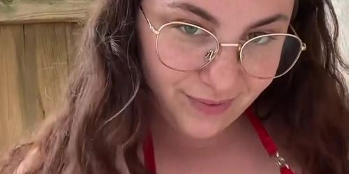 Sexy BBW with glasses in red bikini showing big natural boobs