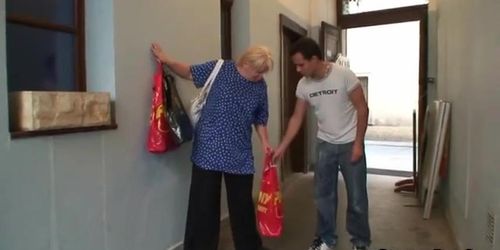 Granny with big tits is happy to take a younger cock