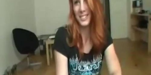 Sexy redhead shakes her big booty and lapdances