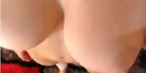 Hot girl with big boobs stripteasing and seducing on webcam