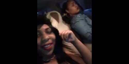 ratchet ebony's flashing boobs and twerking in the car