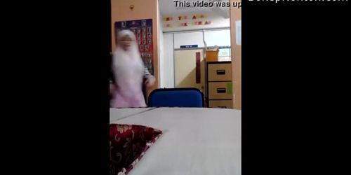 Naughty hijab girl shows her tits in public library