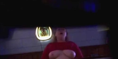 Fat Grandma Chrissy Krug dances with her top up showing her boobs in the basement