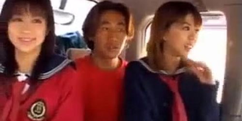2 Asians suck cock in car