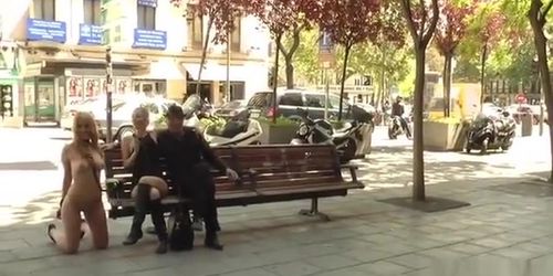 Naked blonde kneeling in public streets