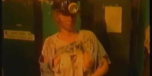 80s model working in a mine