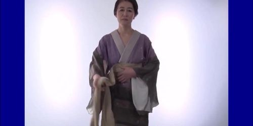 Attractive Older Japanese Lady Strip Dance