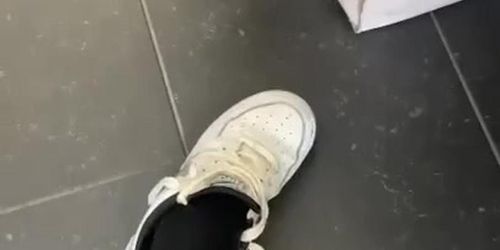 Taking off sweaty shoes and socks