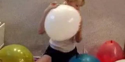 blonde with balloons