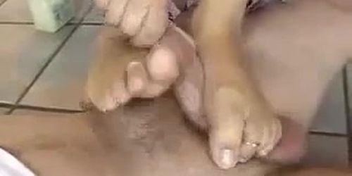 Blonde milf beautiful feet jerks cum on her toes