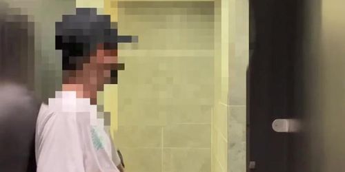 Asian boy jerking off in public toilet