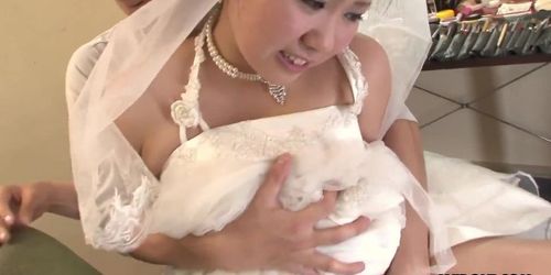 Japanese girl in a wedding dress Emi Koizumi takes a rough cock in her mouth uncensored.