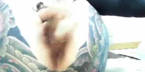 asian tattoed woman cam masturbation