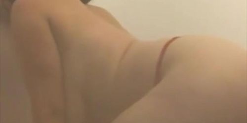 Watch busty MILF sucking off dildo in steamy webcam solo