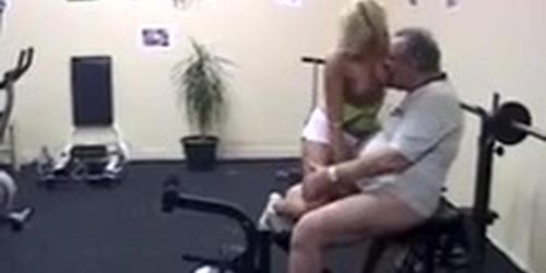 Beautiful busty teen blows a grandpas cock in the gym