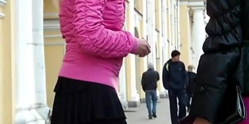 A sexy blonde gets filmed by her bf on the street