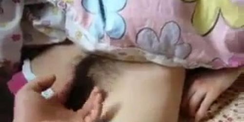 Sleeping Asian gets hairy pussy fingered