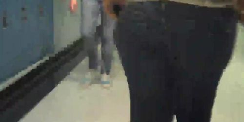 Big butt in jeans parading her ass round