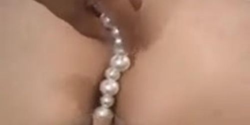 Asian girl enduring many anal insertions and fisting