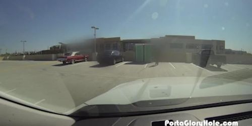 Porta Gloryhole horny office worker gives blowjobs in the parking lot