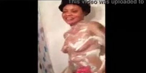 It is about curvy black chick taking a hot shower rubbing her pussy with finger and soap, so sexy.