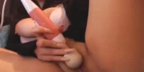 Beautiful brunette with horny face plays pussy with toys