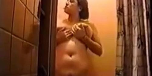 girl with nice boobs filming herself in shower