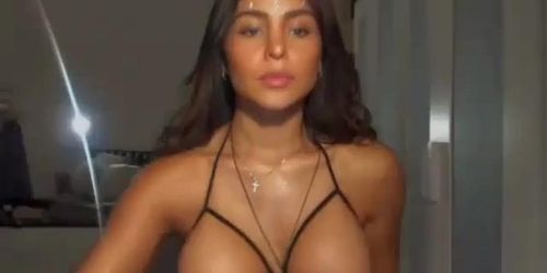 Hot brunette with sexy lingerie show