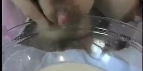 a wet nurse milks her boobs