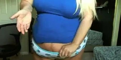 Big Blonde Woman Strips And Masturbates