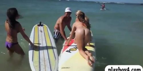 Naked badass babes enjoyed water surfing with the real pro