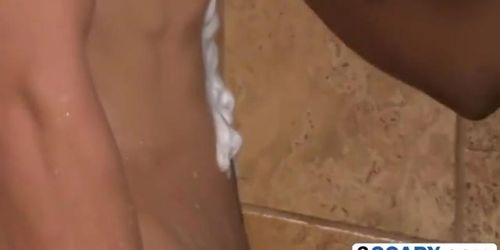 Ebony masseur pleases a white studs cock in the shower