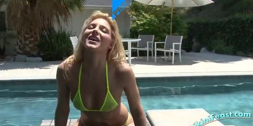 Alluring Blonde In A String Bikini